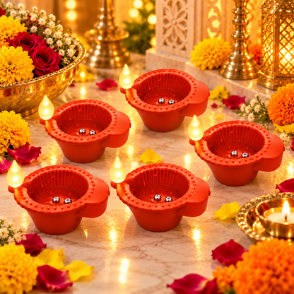 KURTIVERSE terracotta-colour water sensor LED diyas in a festive floral display
